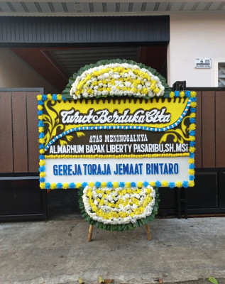 Papan Bunga Duka di Aur Mulio
